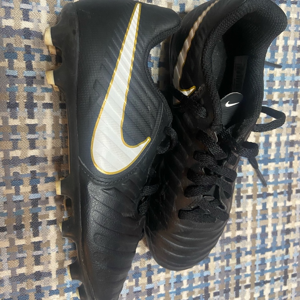Boys Nike soccer cleats. Size 13.